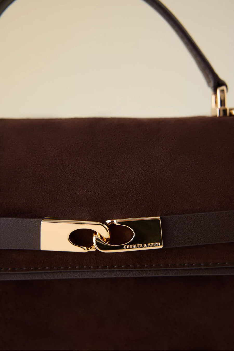 charles keith arlet belted top handle bag
