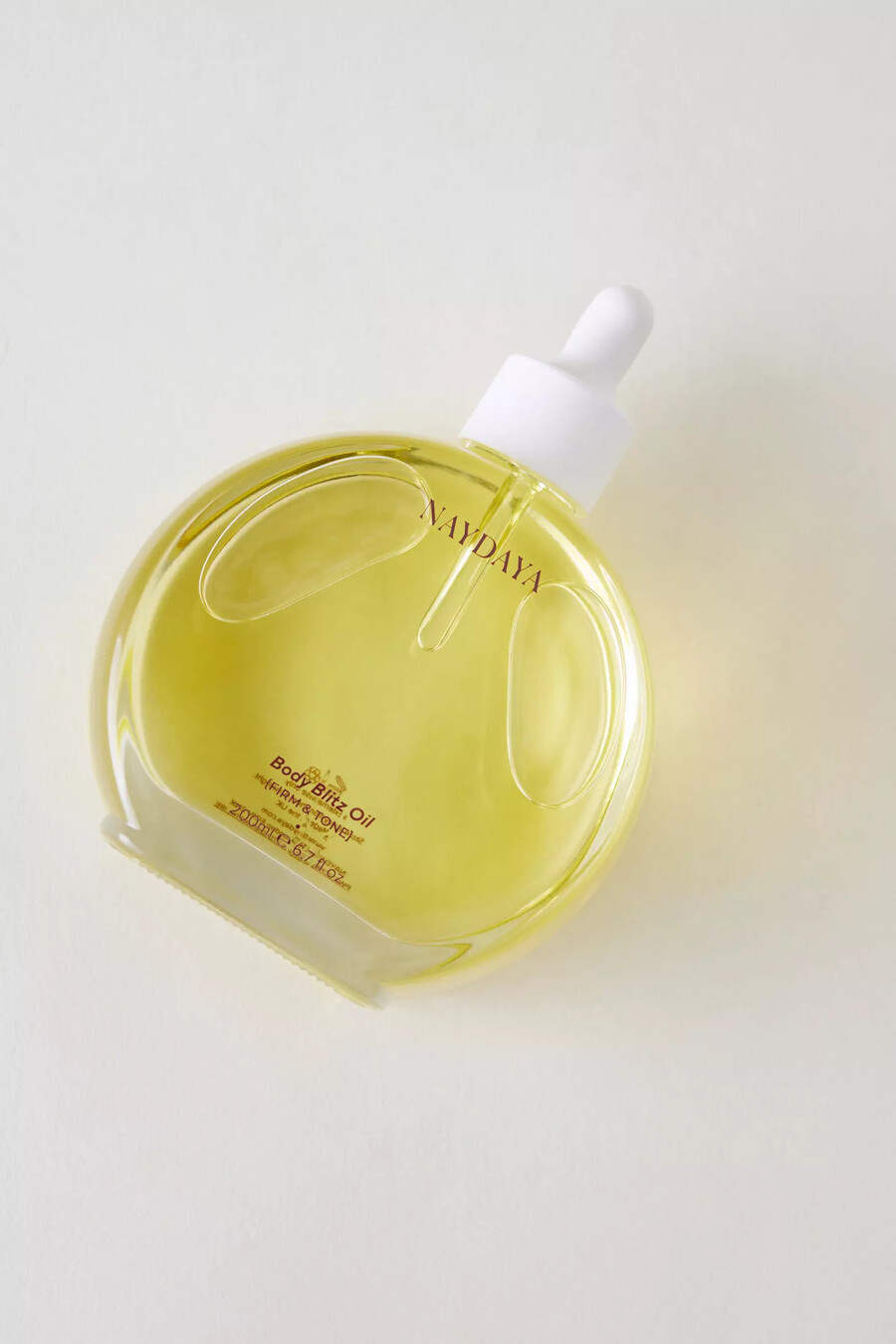 naydaya body blitz firm tone oil