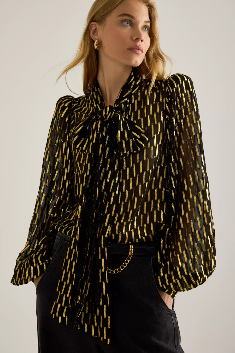 queens of archive foxy bow-front blouse