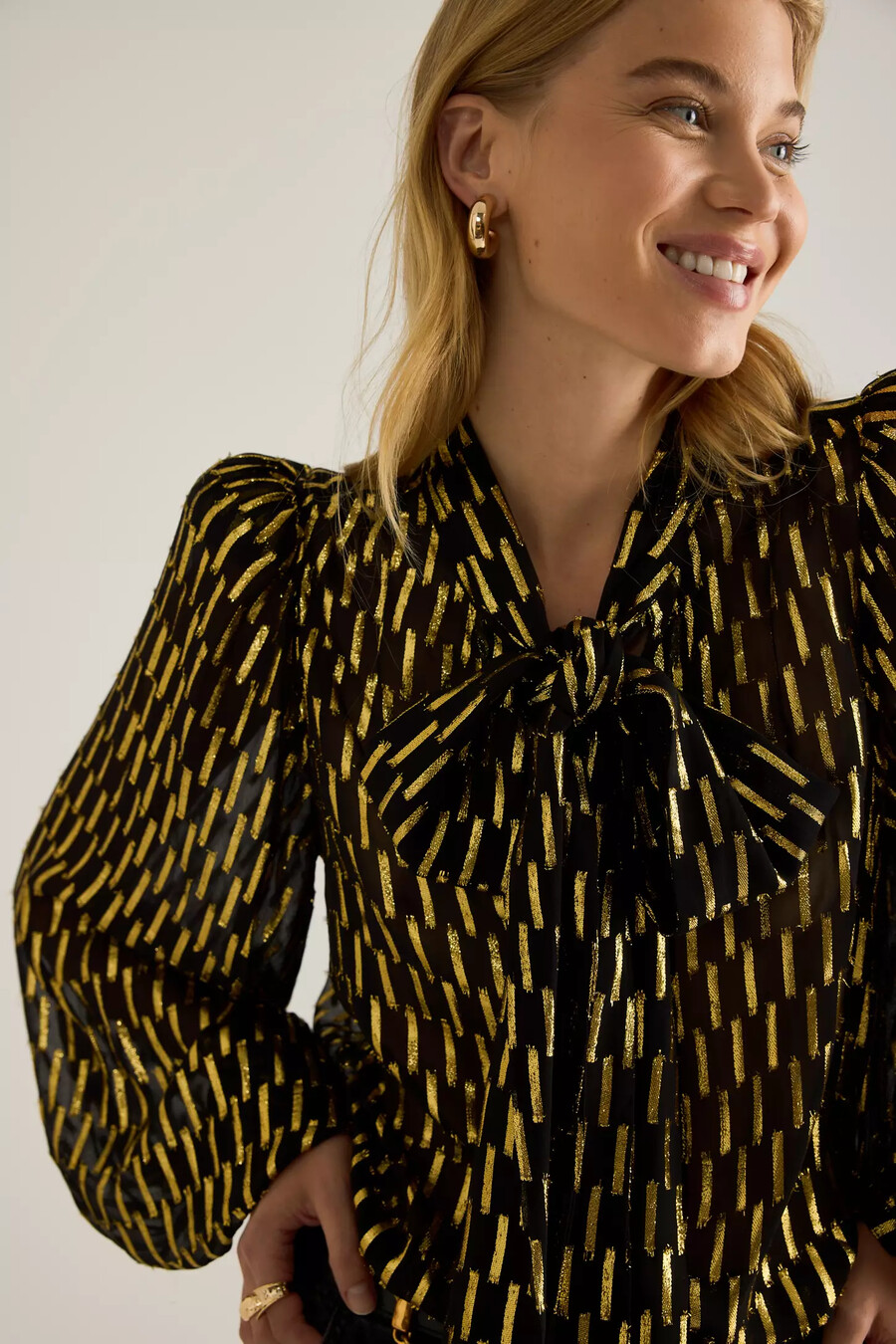 queens of archive foxy bow-front blouse
