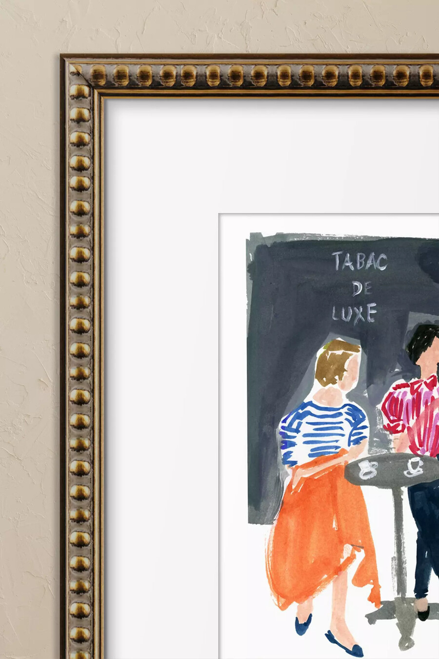 women at paris café framed wall art