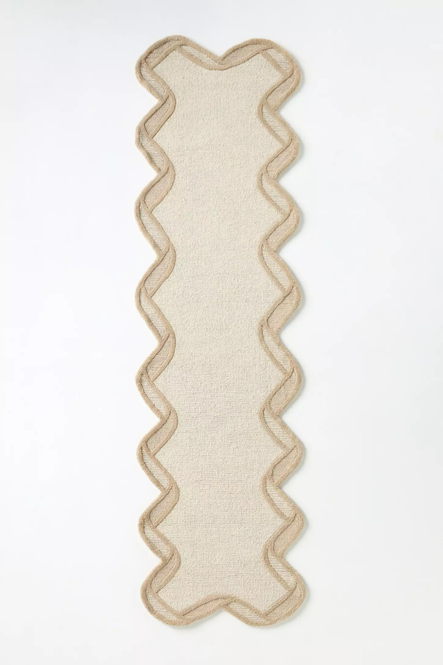 tufted wool scalloped border rug