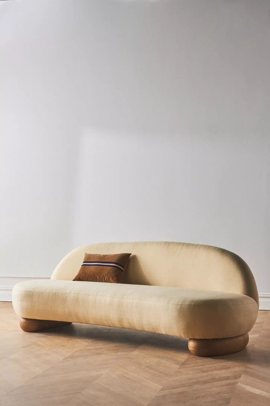 remy sculptural armless sofa